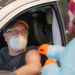 courtesy of Chris Majors 
A vaccination at the mass clinic at the Port of Grays Harbor in January, when vaccine demand was high and supplies were limited. Now vaccines are available at numerous providers across the county.