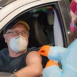 courtesy of Chris Majors 
A vaccination at the mass clinic at the Port of Grays Harbor in January, when vaccine demand was high and supplies were limited. Now vaccines are available at numerous providers across the county.