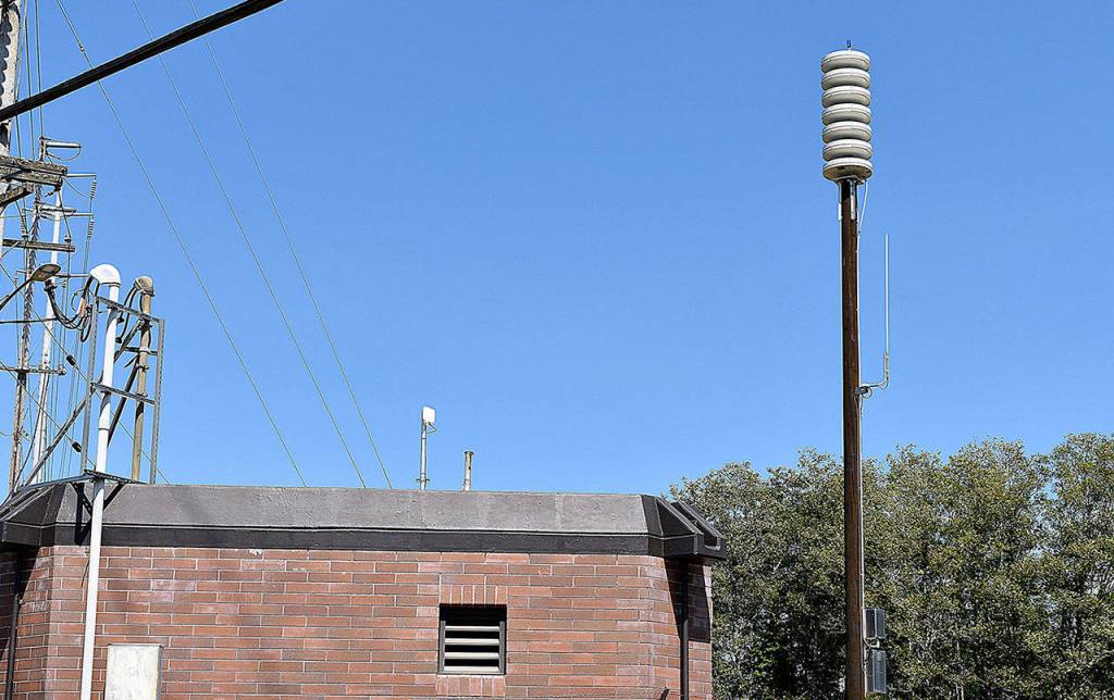 DAN HAMMOCK | THE DAILY WORLD 
One of the 12 recently-installed tsunami warning sirens juts above the City of Hoquiam Queen Pump Station, near the Little Hoquiam Shipyard on the north end of town.