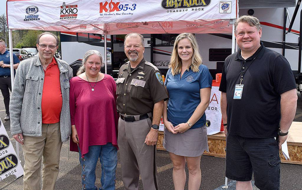 DAN HAMMOCK | THE DAILY WORLD 
Some of the leaders of the countys COVID-19 response thanked the many volunteers who helped with the mass vaccination site and other pandemic response efforts at Saturdays Emergency Preparedness Expo in Aberdeen. From left, County Health Officer Dr. John Bausher, Dr. Julie Buck, Sheriff Rick Scott, Deputy Director of Grays Harbor County Emergency Management Hannah Cleverly and Grays Harbor County Public Health Director Mike McNickle.
