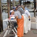 DAN HAMMOCK | THE DAILY WORLD 
Volunteers with the Mission Outdoors Washington Tuna Classic filet the days catch in the Westport boat basin. The year this photo was taken, 2019, the tournament donated close to 10,000 pounds of tuna for local food banks.