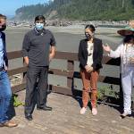Courtesy of U.S. Rep. Derek Kilmer 
From left, U.S. Rep. Derek Kilmer, Quinault Indian Nation President Guy Capoeman, U.S. Secretary of the Interior Deb Haaland and Quinault Indian Nation Vice President Fawn Sharp talk climate resiliency and village relocation in Taholah.
