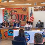 Suquamish Tribal Chairman Leonard Foresman, left, speaks to U.S. Rep. Derek Kilmer and U.S. Secretary of the Interior Deb Haaland at a listening session inside the Quinault Indian Nations Joseph B. DeLaCruz tribal council chambers in Taholah Monday. (Courtesy U.S. Rep. Derek Kilmer)
