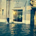 daily world File photo
A pedestrian wades through deep water in front of the Becker Building at the corner of Wishkah and I streets in Aberdeen after heavy rains caused widespread flooding on Jan. 4, 2014.