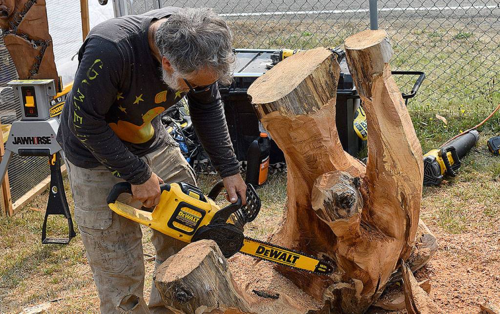 DAN HAMMOCK | THE DAILY WORLD 
Sculpture artist Luke Gumaelius got word from local family about the Tokeland Woodfest and traveled north from his home in Los Osos, Calif., to participate this year.
