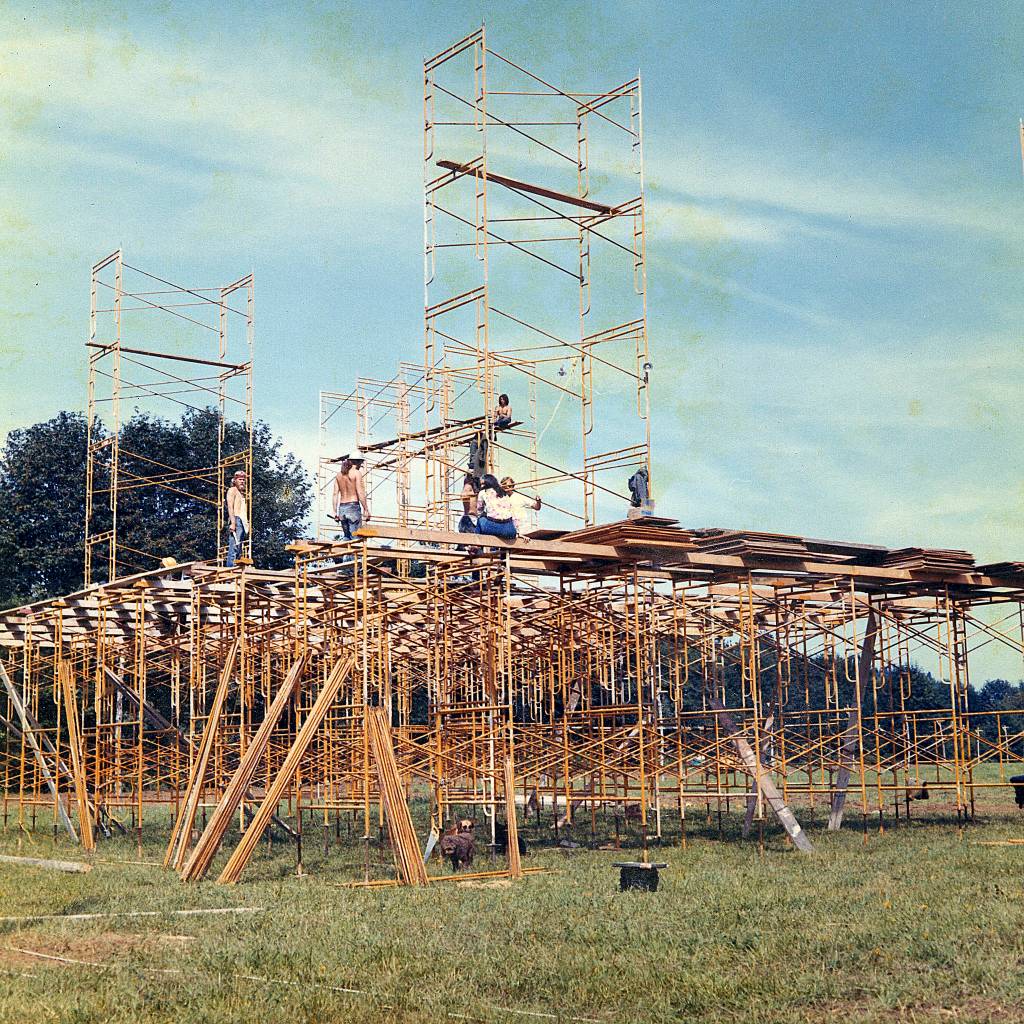 Workers put together the massive stage at the 1971 Satsop River music festival. 	courtesy of darrell Westmoreland
