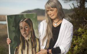 photos by Judith Altruda 
Shoalwater Bay Tribe member Mary Downs with a portrait Eugene Landry painted of her in 1969. It will be part of the display of Landrys works at the tribes museum starting Sept. 17, 2021.