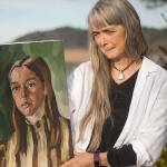 photos by Judith Altruda 
Shoalwater Bay Tribe member Mary Downs with a portrait Eugene Landry painted of her in 1969. It will be part of the display of Landrys works at the tribes museum starting Sept. 17, 2021.