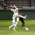 PHOTO BY BEN WINKELMAN 
Aberdeen defensive back Jakob Bowers (12) intercepts a pass during the Bobcats 40-8 win over Hoquiam in the 116th Myrtle Street Rivalry on Sept. 3, 2021. Aberdeen hosts Mark Morris in a Week 2 matchup on Friday.