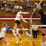 PHOTO BY PATTI REYNVAAN Hoquiams Chloe Kennedy (5) rises for a kill during the Grizzlies straight-set, season-opening victory over Aberdeen on Tuesday in Hoquiam.