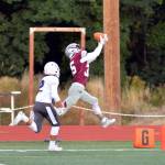 RYAN SPARKS | THE DAILY WORLD Montesano receiver Caydan Lovell, right, scores a touchdown on a pass from quarterback Jayden McElravy in the first half of a 43-0 victory over Cascade Christian on Friday in Montesano.