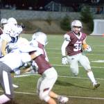 RYAN SPARKS | THE DAILY WORLD Montesano running back Isaiah Pierce (31) carries the football against Cascade Christian on Friday at Jack Rottle Field in Montesano.