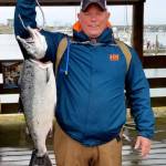 photo by Westport Weighmaster 
Rob Jorstad of Olympia with his winning coho. Hell pick up his $1,500 prize on Saturday for the largest coho of the season in the Westport Charterboat Association derby.
