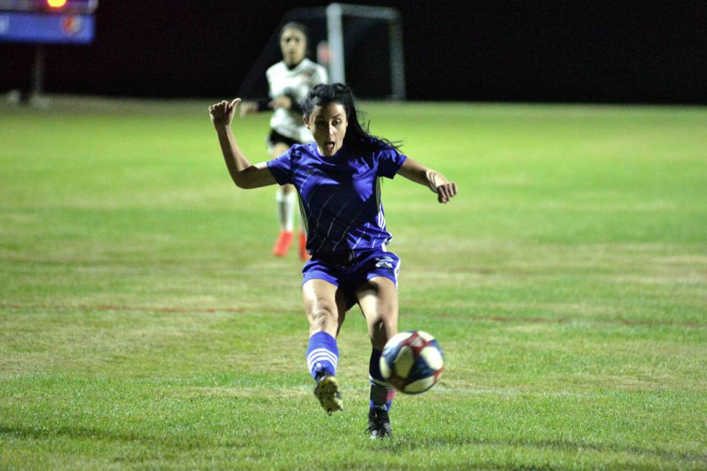 RYAN SPARKS | THE DAILY WORLD Elma forward Chloe Clark scores the first of her two goals in the second half of the Eagles 6-1 victory over Napavine on Thursday at Davis Field in Elma.