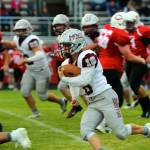PHOTO BY SHAWN DONNELLY Montesano running back Jacob Salstrom (18) carries the football during the Bulldogs 53-0 win over Columbia-White Salmon on Thursday in Columbia.