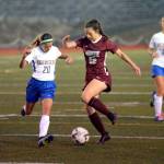 RYAN SPARKS | THE DAILY WORLD Montesano midfielder Bethanie Henderson (22) dribbles against Rochester on Tuesday in Montesano. The Bulldogs won 8-0.