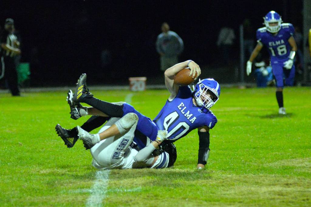 RYAN SPARKS | THE DAILY WORLD Elma running back Conan Baxter returned to the lineup and ran for 100 yards and a pair of touchdowns against Kings Way Christian on Friday in Elma.