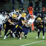 RYAN SPARKS | THE DAILY WORLD Aberdeen defensive lineman Nolan Cook sacks Black Hills quarterback Jaxsen Beck during a game on Friday in Aberdeen. Aberdeens defense did not allow an offensive point in the victory.