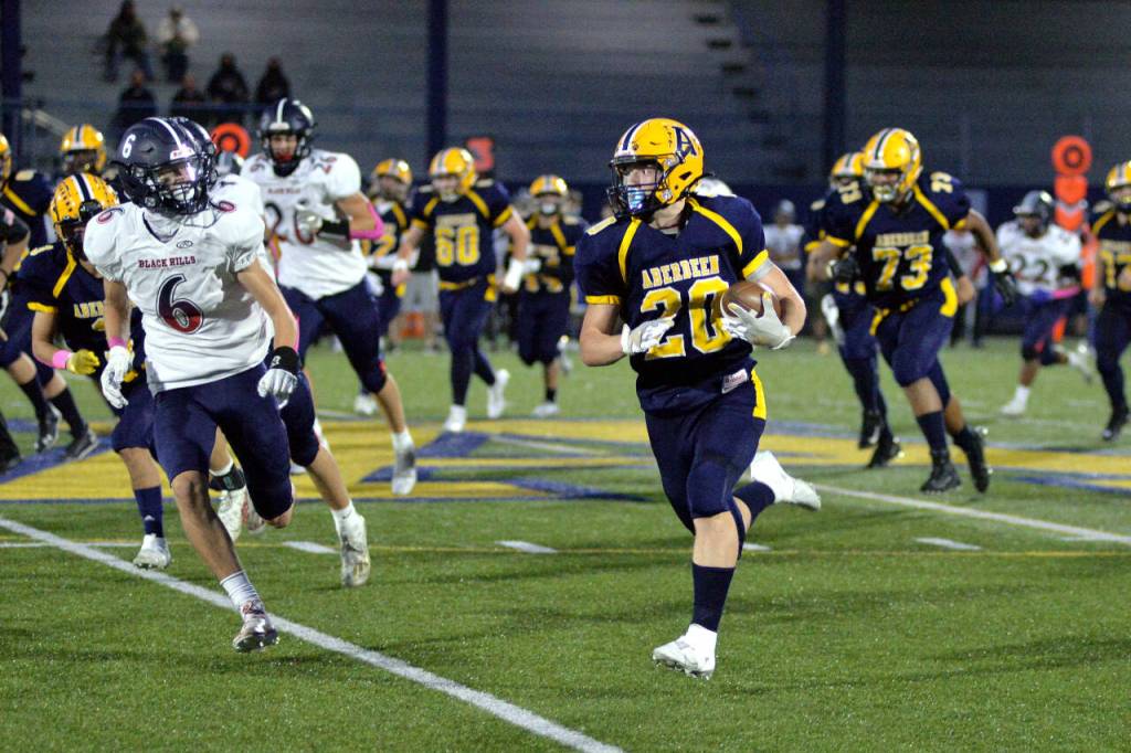 RYAN SPARKS | THE DAILY WORLD Aberdeen running back Jeremy Sawyer (20) ran for a game high 151 yards during the Bobcats 20-7 win over Black Hills on Friday night at Stewart Field in Aberdeen.