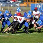 RYAN SPARKS | THE DAILY WORLD Elma running back Jarred Bailey (37) is met by Mt. Baker defender Marques George (9) during a game on Saturday at Davis Field in Elma.