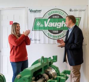 Stacie Vaughan, CFO of Vaughan Industries, accepts the 2021 AWB Manufacturer of the Year award from AWB President Kris Johnson on Oct. 1, 2021, during a visit by the AWB Manufacturing Week bus tour to Vaughans Montesano facility. (Photo: Brian Mittge/AWB).