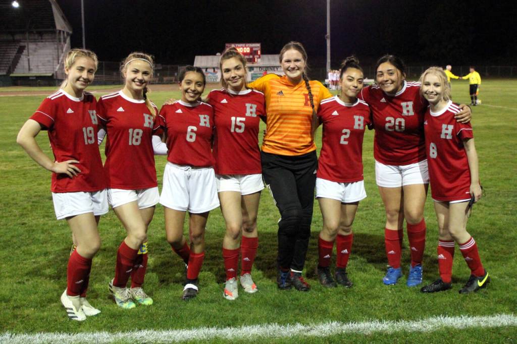 PHOTO BY BEN WINKELMAN Hoquiam girls soccer seniors Emma Johnson, Ellie Winkelman, Jasmine Renteria, Yesica Pena, Katie Burnett, Leslie Nieto, Viridiana Cordova-Aguirre and Jordan Lutes pose for a photo during Thursdays Senior Night game in Hoquiam.