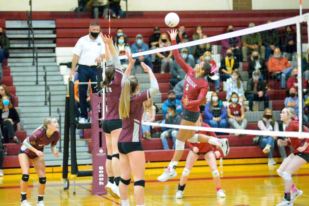 RYAN SPARKS | THE DAILY WORLD Hoquiam middle blocker Chloe Kennedy (5) attempts a drop shot against Montesano on Tuesday. Kennedy went down with a left knee injury in the second set and did not return.