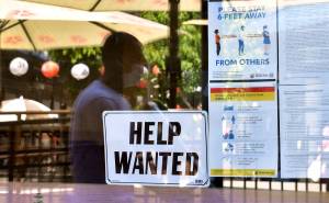 Frederic J. Brown | AFP | Getty Images
A Help Wanted sign is posted beside coronavirus safety guidelines in front of a restaurant in Los Angeles on May 28, 2021.