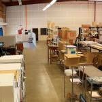 The orange lines on the back wall of the warehouse storing the Aberdeen Museums artifacts are part of an elaborate fire detection system that can be moved from the warehouse to another location when one is secured. (Courtesy Aberdeen museum board)