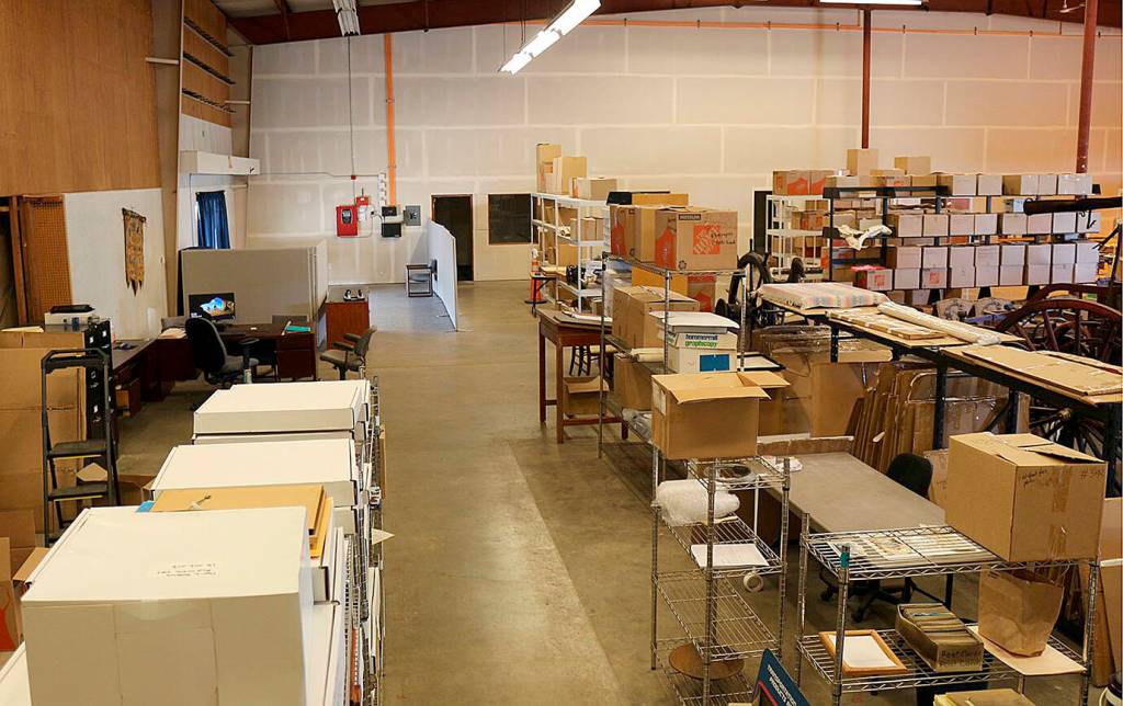 The orange lines on the back wall of the warehouse storing the Aberdeen Museums artifacts are part of an elaborate fire detection system that can be moved from the warehouse to another location when one is secured. (Courtesy Aberdeen museum board)