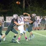 RYAN SPARKS | THE DAILY WORLD Montesano quarterback Jayden McElravy (11) threw for five touchdowns and ran for another in Montes 61-0 win over Hoquiam on Friday in Montesano.