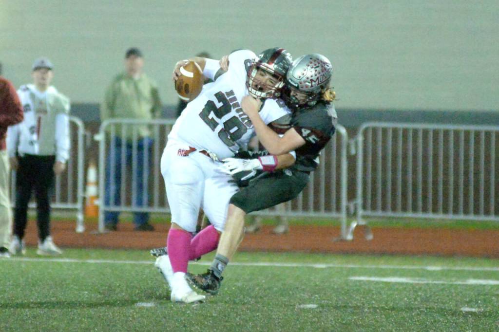 RYAN SPARKS | THE DAILY WORLD Montesano linebacker Jared Whisenhunt sacks Hoquiams Jalen Hobucket during the Bulldogs 61-0 victory on Friday in Montesano.