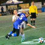 RYAN SPARKS | THE DAILY WORLD 
Elma midfielder Janessa Sample (5) is fouled by Seton Catholic defender Sofia Aragon during the Eagles 1-0 district-playoff win on Tuesday in Montesano.