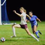 DAILY WORLD FILE PHOTO Montesano forward Mikayla Stanfield, left, is marked by Elma Defender Diana Guzman during a game earlier this season. Stanfield led the 1A Evergreen League in goals this season and was named League MVP last week. Guzman was named a First Team All-League defender.