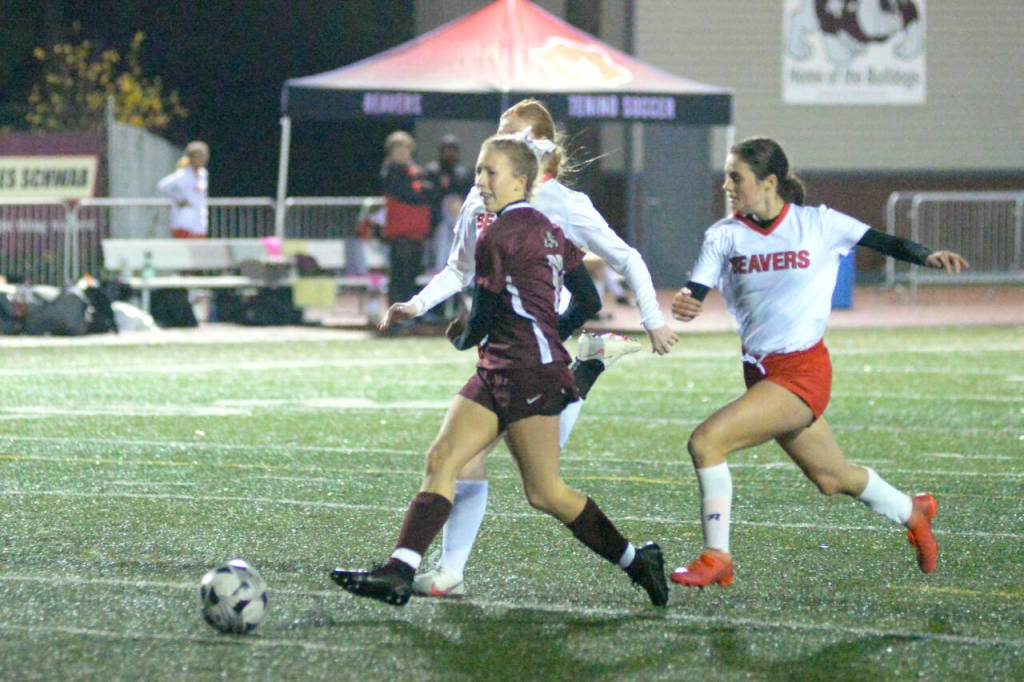 RYAN SPARKS | THE DAILY WORLD Montesano midfielder Lily Causey scores after receiving a through pass from teammate Mikayla Stanfield in the first half of the Bulldogs 4-0 win over Tenino on Thursday in Montesano. The victory earned Monte a spot in the 1A District 4 title game against La Center on Saturday in Vancouver.