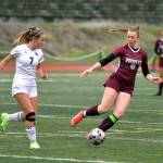 RYAN SPARKS | THE DAILY WORLD Montesano midfielder Paige Lisherness (8) defends against Lakeside-Nine Mile Falls midfielder Ayanna Tobek during Montes 3-1 state-playoff victory on Wednesday in Montesano.
