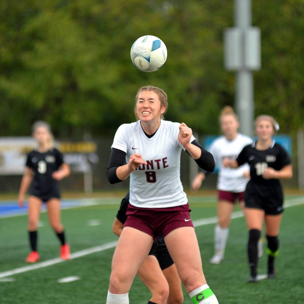 RYAN SPARKS | THE DAILY WORLD Montesano midfielder Paige Lisherness heads the ball during Montes 5-0 loss in the states third/fourth-place game on Saturday at Shoreline Stadium in Shoreline.