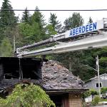 DAN HAMMOCK | THE DAILY WORLD, file 
An Aberdeen ladder truck stands by as firefighters mop up a house fire on Duffy Street in July 2019.
