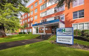 Courtesy of Harbor Regional Health 
The Harbor Regional Health Community Hospital Foundation has dedicated the former East Campus building in honor of Richard and Patricia Warren.
