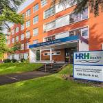 Courtesy of Harbor Regional Health 
The Harbor Regional Health Community Hospital Foundation has dedicated the former East Campus building in honor of Richard and Patricia Warren.