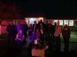 Giving tree deliveries last year included sirens and law enforcement vehicles in lieu of the Shop with a Cop procession.