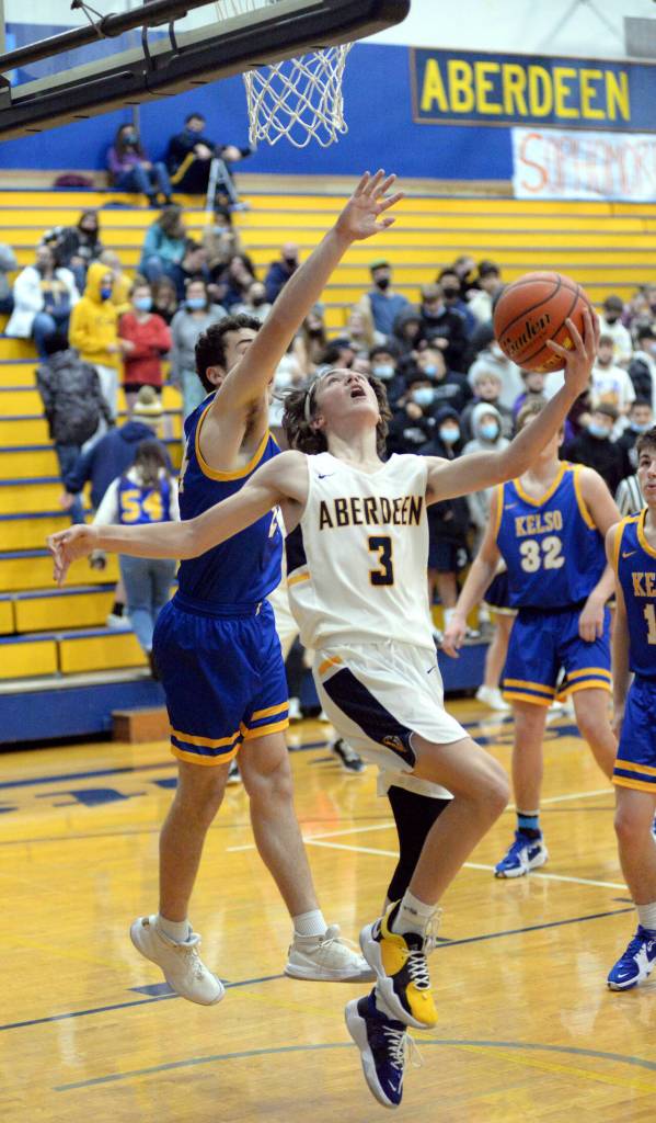 RYAN SPARKS | THE DAILY WORLD Aberdeen senior Jacobi Kozak (3) scores on a reverse layup in the first half of the Bobcats 62-31 loss to Kelso on Tuesday at Sam Benn Gym in Aberdeen.