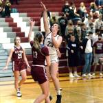 RYAN SPARKS | THE DAILY WORLD Montesano senior Paige Lisherness (23) scores from the post against WF Wests Drew Brumfield during Montes 48-29 loss on Tuesday at Montesano High School.