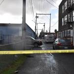 An Aberdeen Police SUV parks perpendicular to the apartment, which was the scene of a shooting Wednesday at 213 N. F St., in Aberdeen. The shooting put Aberdeen High School on a modified lockdown. Aberdeen Detective Sgt. Dave Cox said the school being put on a lockdown was protocol given how close it was to the school. (Matthew N. Wells | The Daily World)