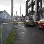 Aberdeen Police tape was affixed to street poles on Wednesday outside of the alleyway behind the apartment building at 213 N. F St., in Aberdeen, which was the scene of a shooting. Aberdeen Police Detective Sgt. Dave Cox said the Aberdeen High School, which was on a modified lockdown, was because because of protocol, given where the shooting occurred. (Matthew N. Wells | The Daily World)
