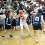 RYAN SPARKS | THE DAILY WORLD
Montesano Caydon Lovell (35) looks to shoot against King's Way Christian's Alex Fulton (15) during the Bulldogs 62-30 loss on Friday in Montesano.