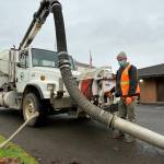 Shane Kohlmeier, operating the City of Hoquiam's Vactor combo truck, said he and his guys use the Vactor truck all the time for different Public Works assignments. (Matthew N. Wells | The Daily World)