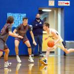 RYAN SPARKS | THE DAILY WORLD
Aberdeen senior Andrew Troeh, right, looks to drive against Hoquiams Owen McNeill (5) during Hoquiams 60-46 victory on Thursday, Dec. 16, 2021, in Aberdeen.