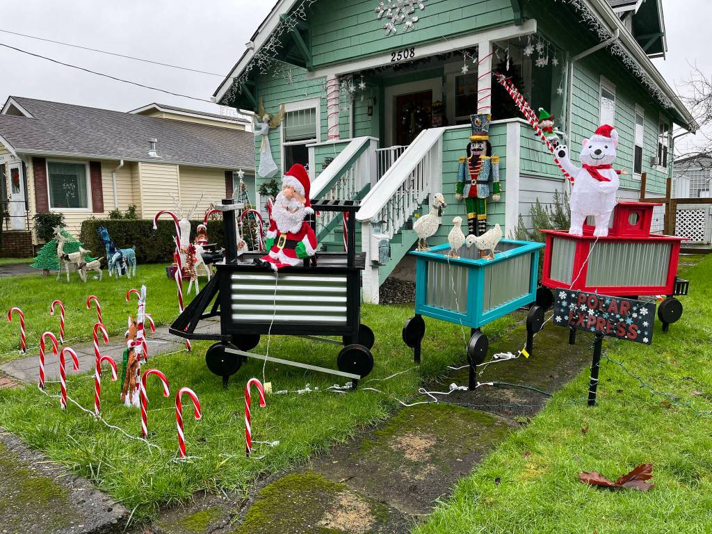 Michele Crane's "Christmas Wonderland" display fills her front yard, and her porch, which are in the 2500 block of Queets Avenue, in Hoquiam. Crane plans next year to expand her yuletide decorations to the back yard.