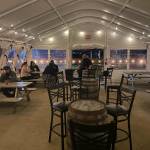 The tent was erected to provide coverage to the pre-existing outdoor beer garden while continuing airflow throughout the space. Photo courtesy of Roy Seeman